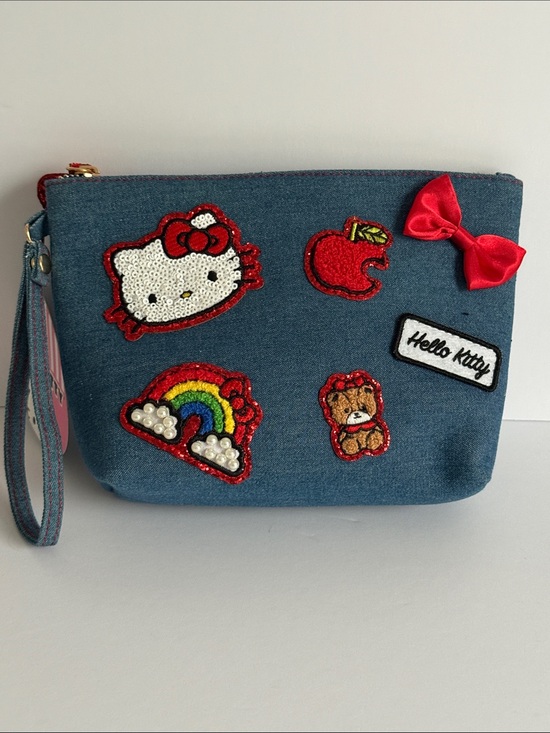 Hello Kitty Handbags - Blue denim pouch featuring embroidered Hello Kitty patches and a red satin bow